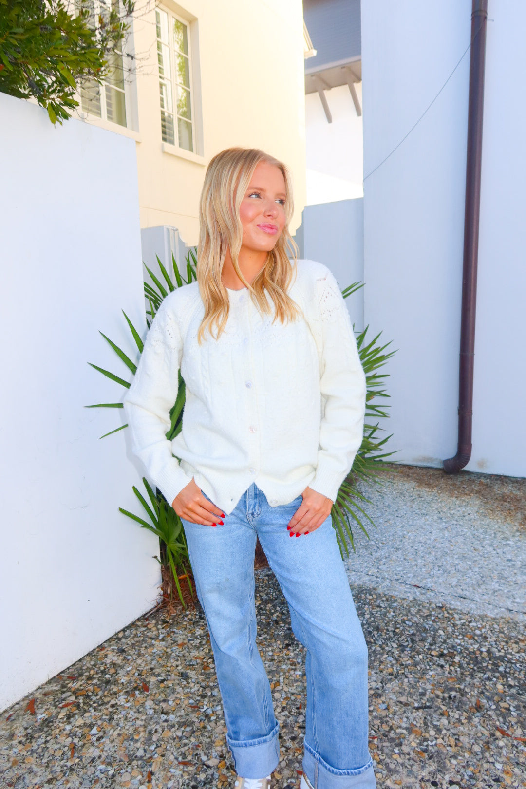 Cozy white knit cardigan designed
